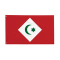 Red flag with a white diamond, green crescent, and green star in the center